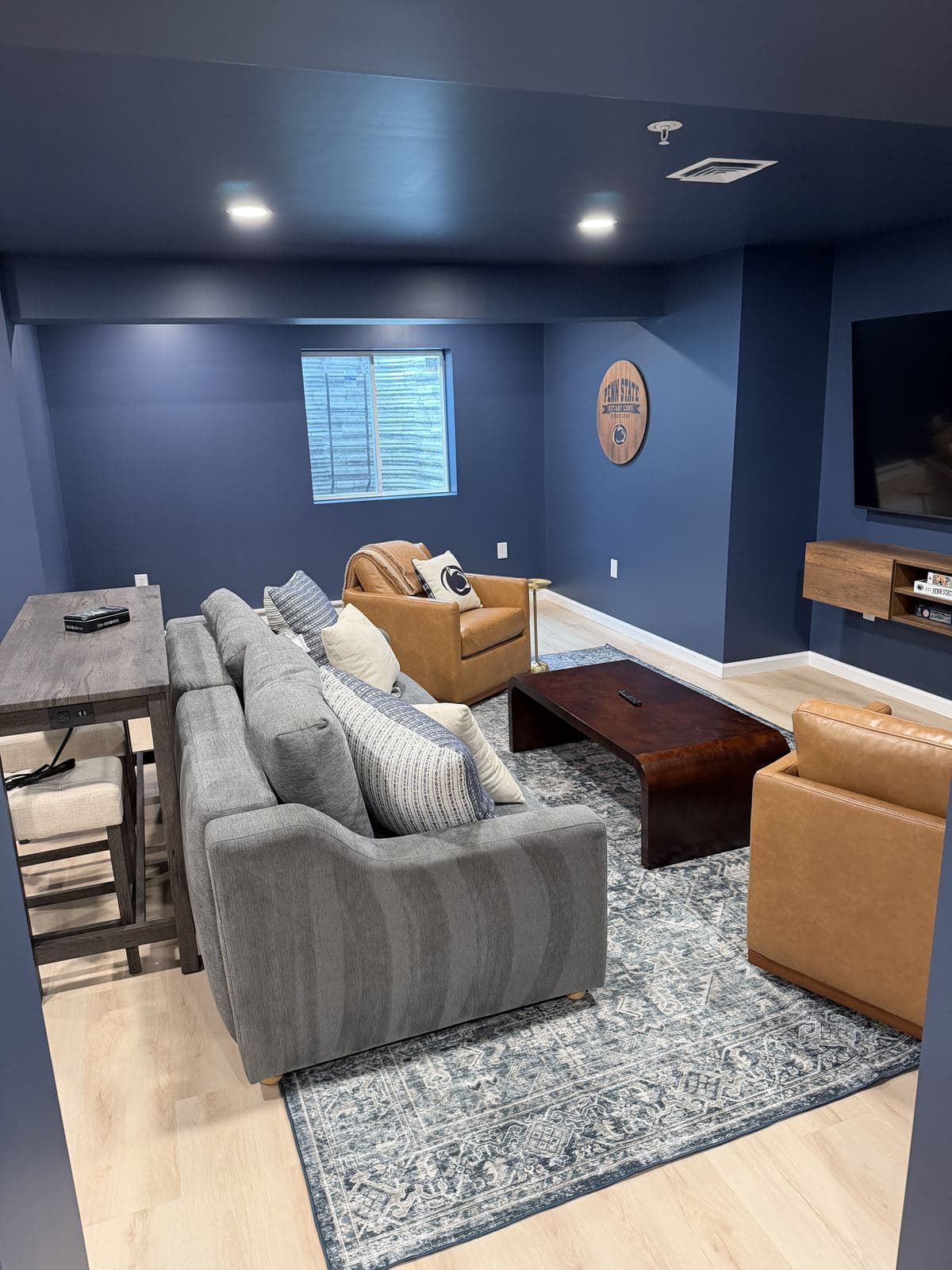 Airbnb turnover — lower-level lounge